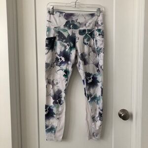 ATHLETA floral high waist running yoga leggings w. mesh panels, pockets. Size M.